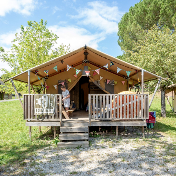 Terrace of a glamping tent at flower camping du Lac du Causse