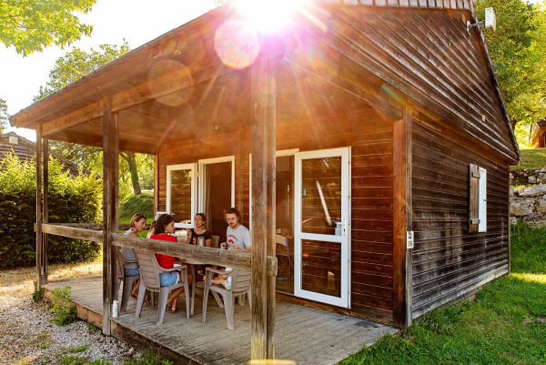 wooden chalets at flower camping du lac du causse near Brive la Gaillarde