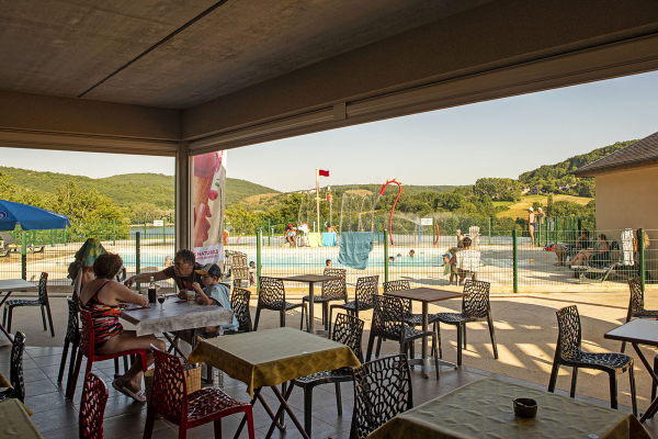 Terrace of the flower campsite snack bar at Lac du Causse